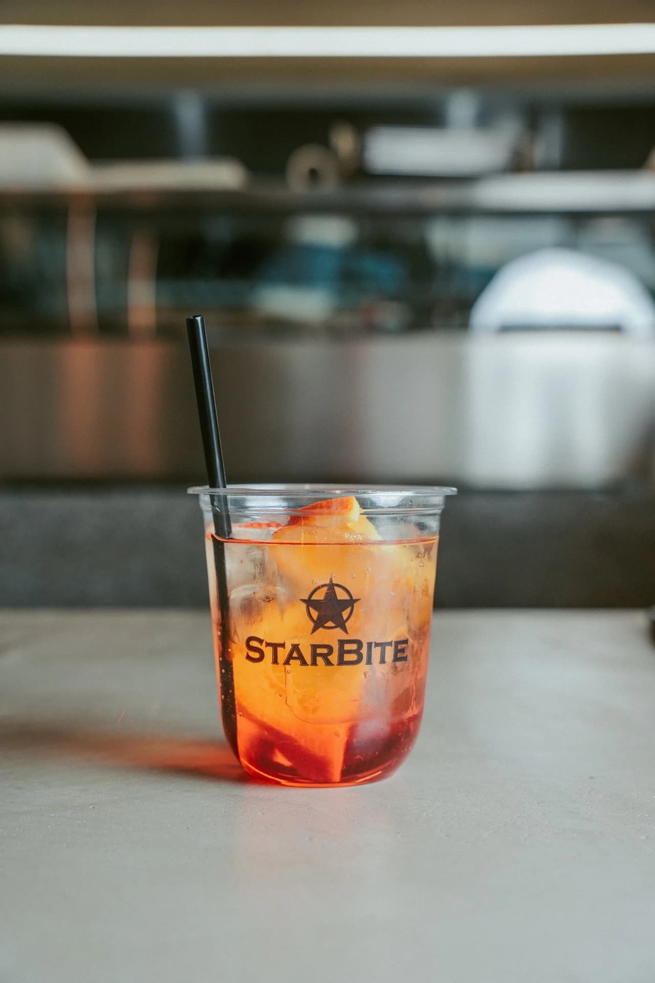 Aperol spritz in a branded Starbite cup