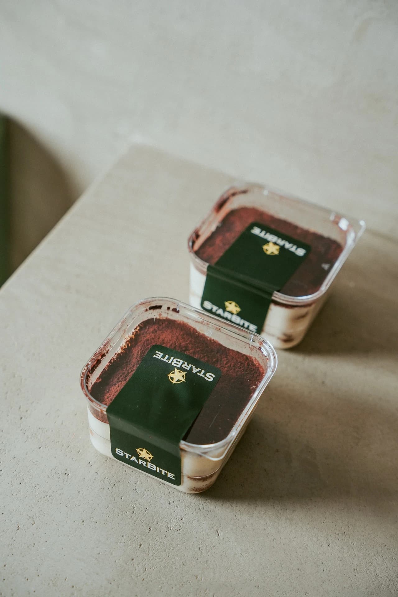 Stacked tiramisu dessert containers